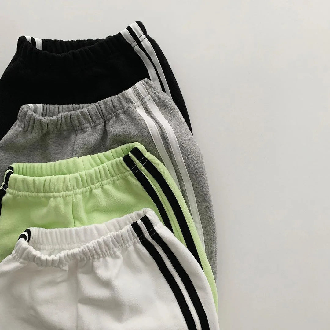 Boys and girls' spring new 2025 children's cool letter printing zipper top pants leisure sports two piece baby suit