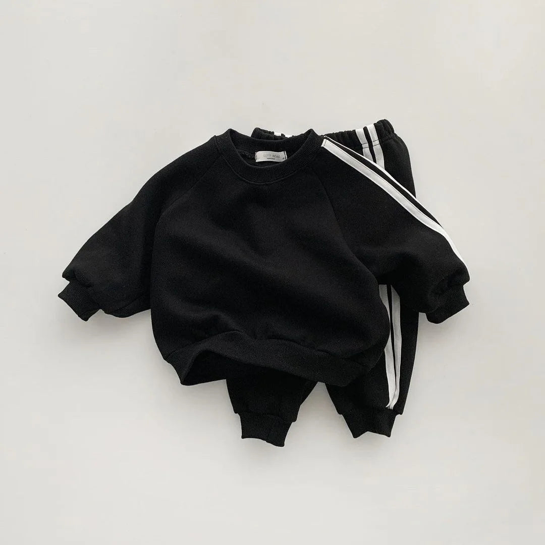 Boys and girls' spring new 2025 children's cool letter printing zipper top pants leisure sports two piece baby suit