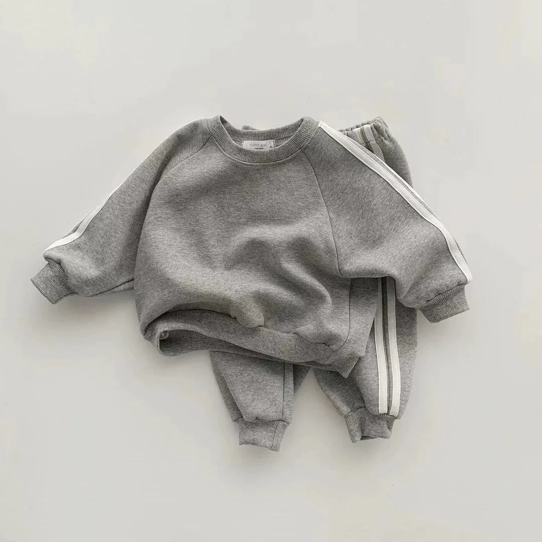 Boys and girls' spring new 2025 children's cool letter printing zipper top pants leisure sports two piece baby suit