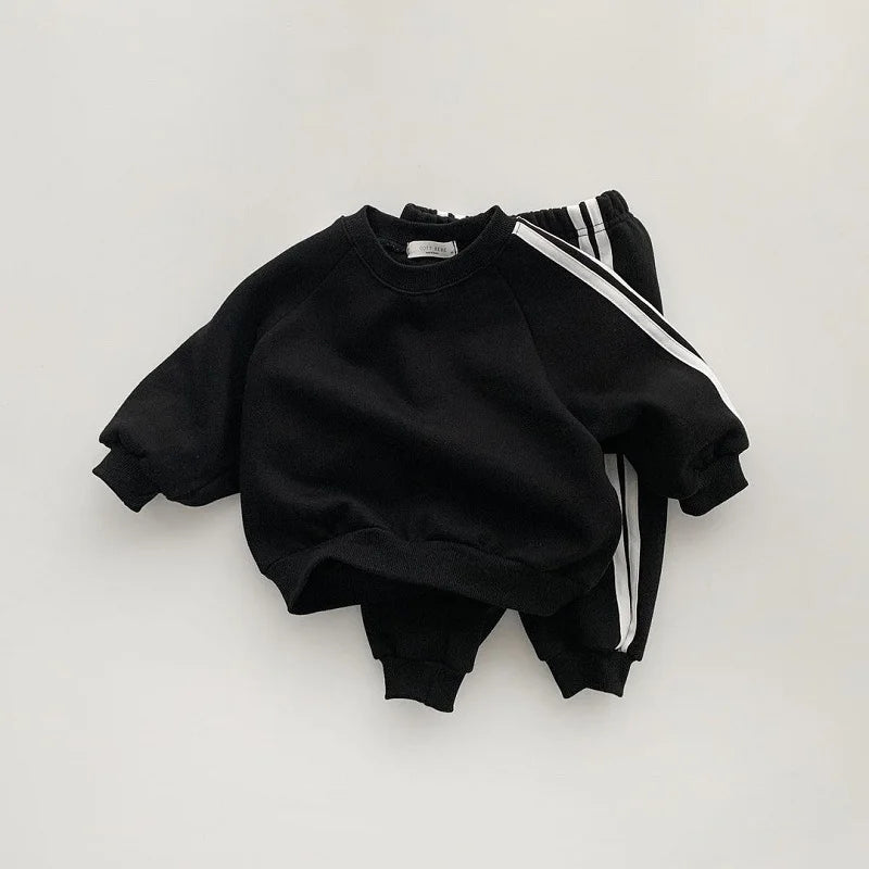 Boys and girls' spring new 2025 children's cool letter printing zipper top pants leisure sports two piece baby suit