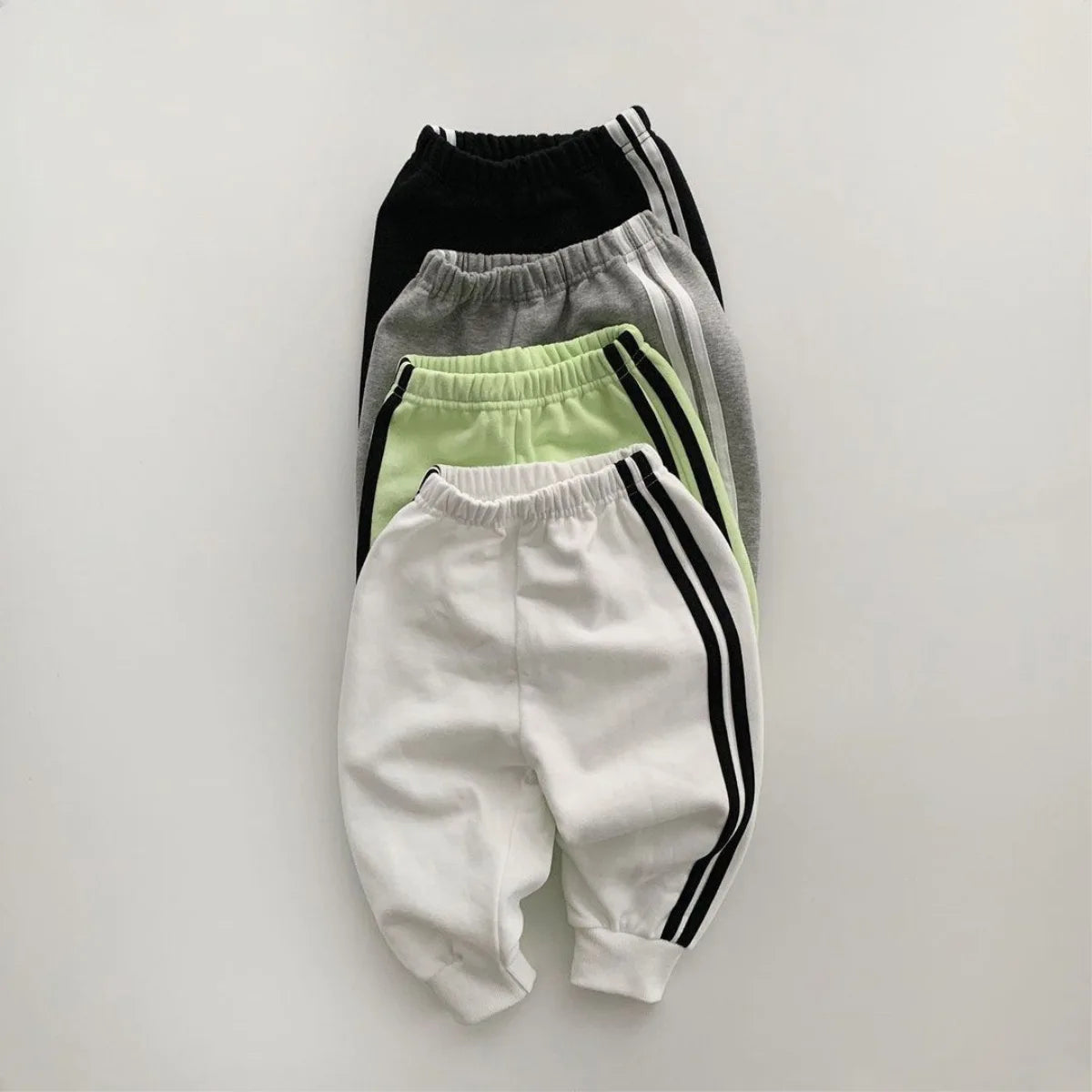 Boys and girls' spring new 2025 children's cool letter printing zipper top pants leisure sports two piece baby suit